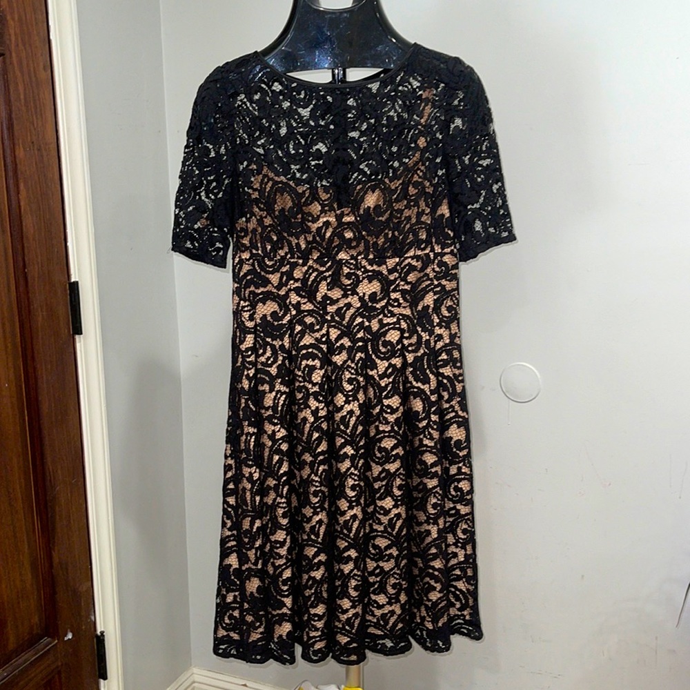 Black and tan pleated dress.